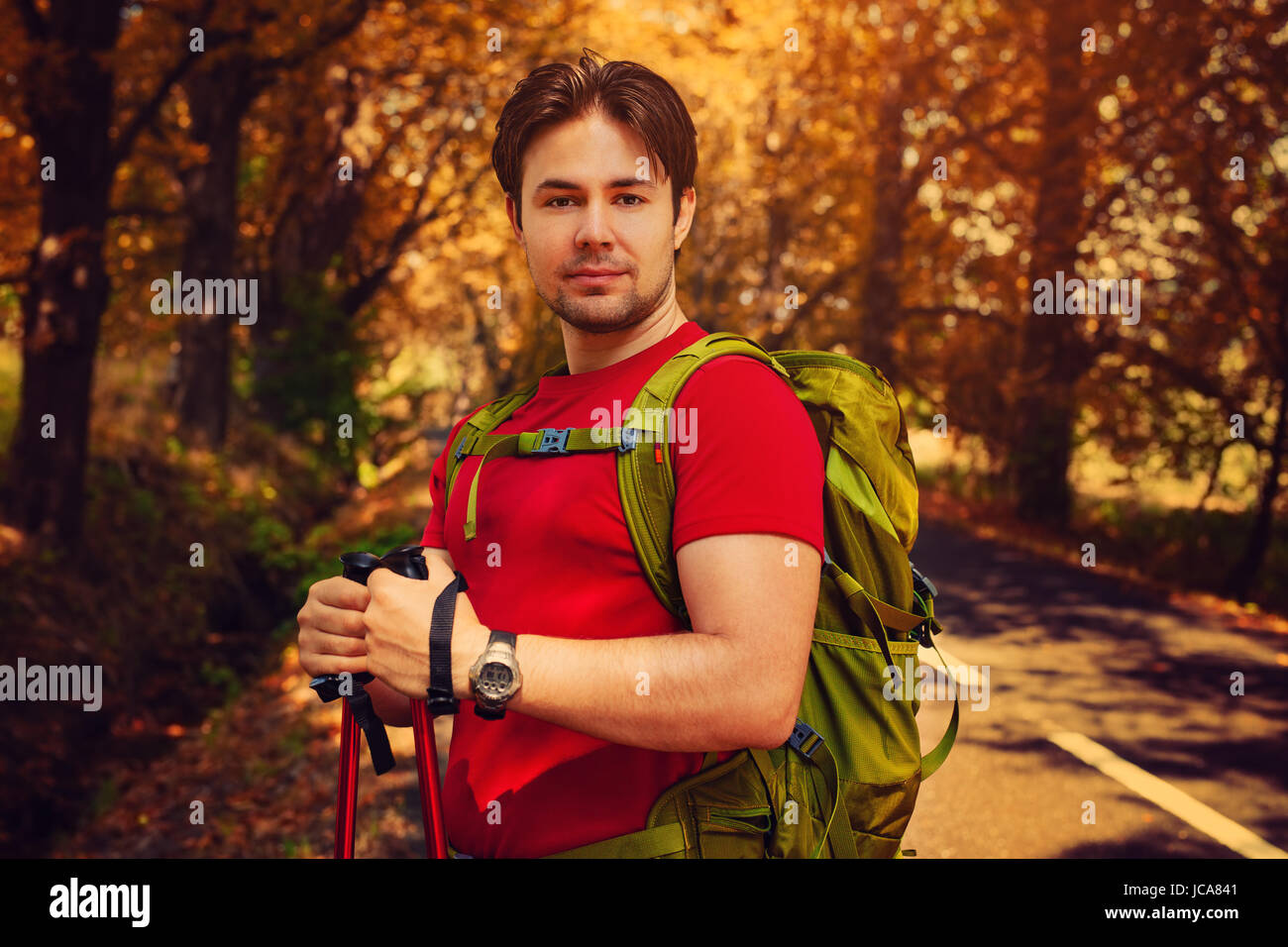 Young man walking stick hi-res stock photography and images - Alamy
