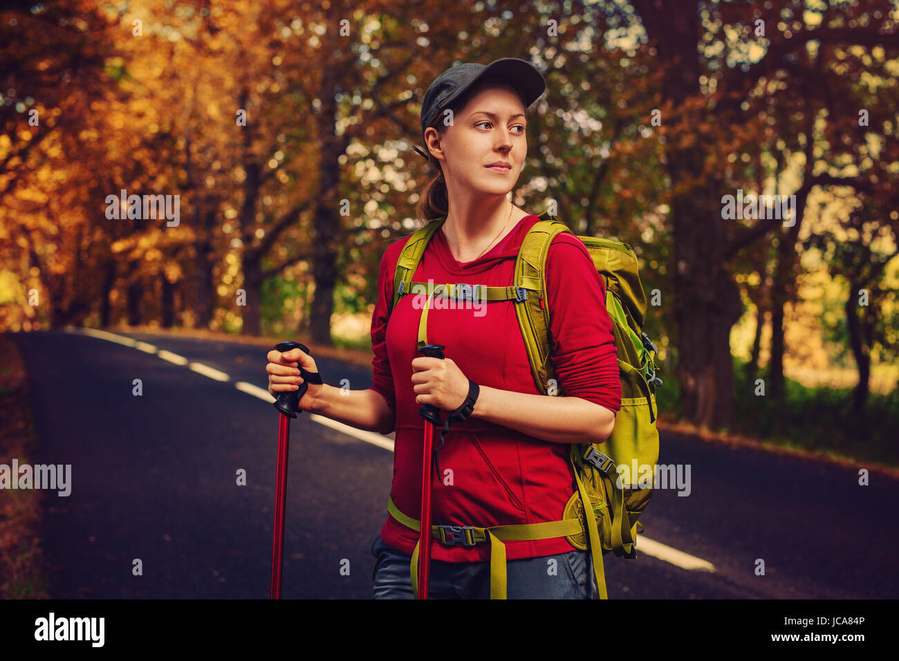 Woman with walking stick hi-res stock photography and images - Alamy