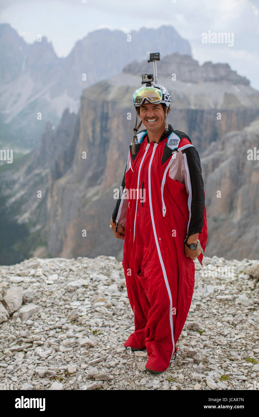 Portrait of base jumper, Marshall Miller just before taking flight in the Sass Pordoi region of the Dolomites in Northeastern Italy. Stock Photo