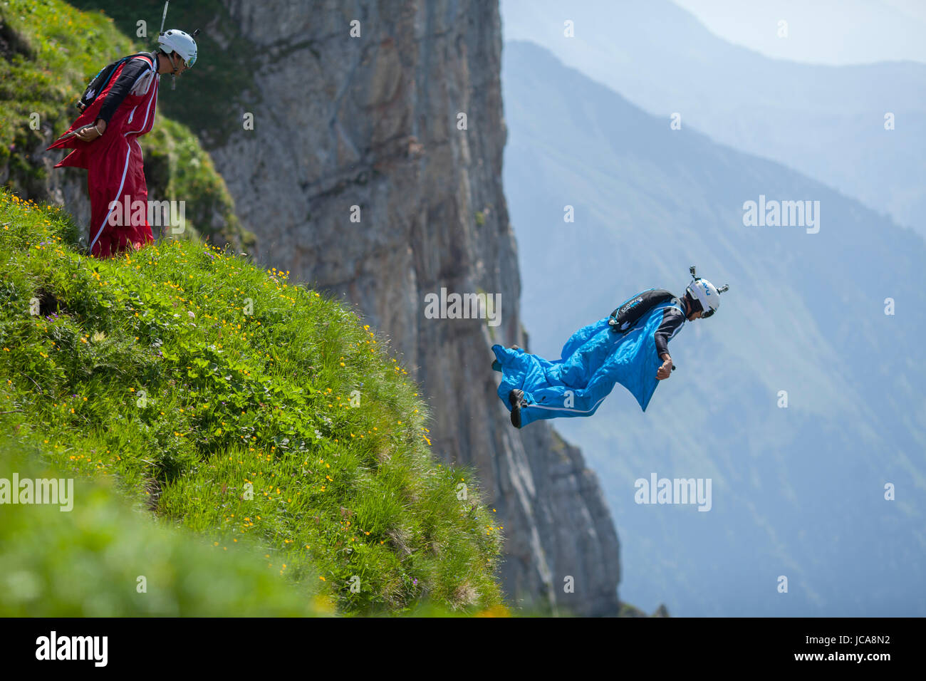 Wing suit pilot Jesse Hall exiting for the Crack in the Toggenburg region of Switzerland. Stock Photo