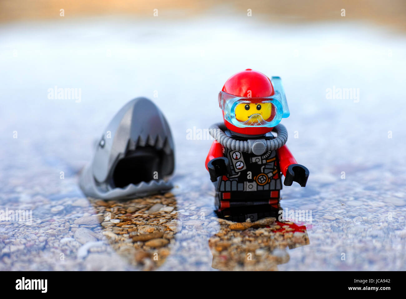 Paphos, Cyprus - October 09, 2016 Lego shark preparing to attack scuba diver in the sea. Stock Photo