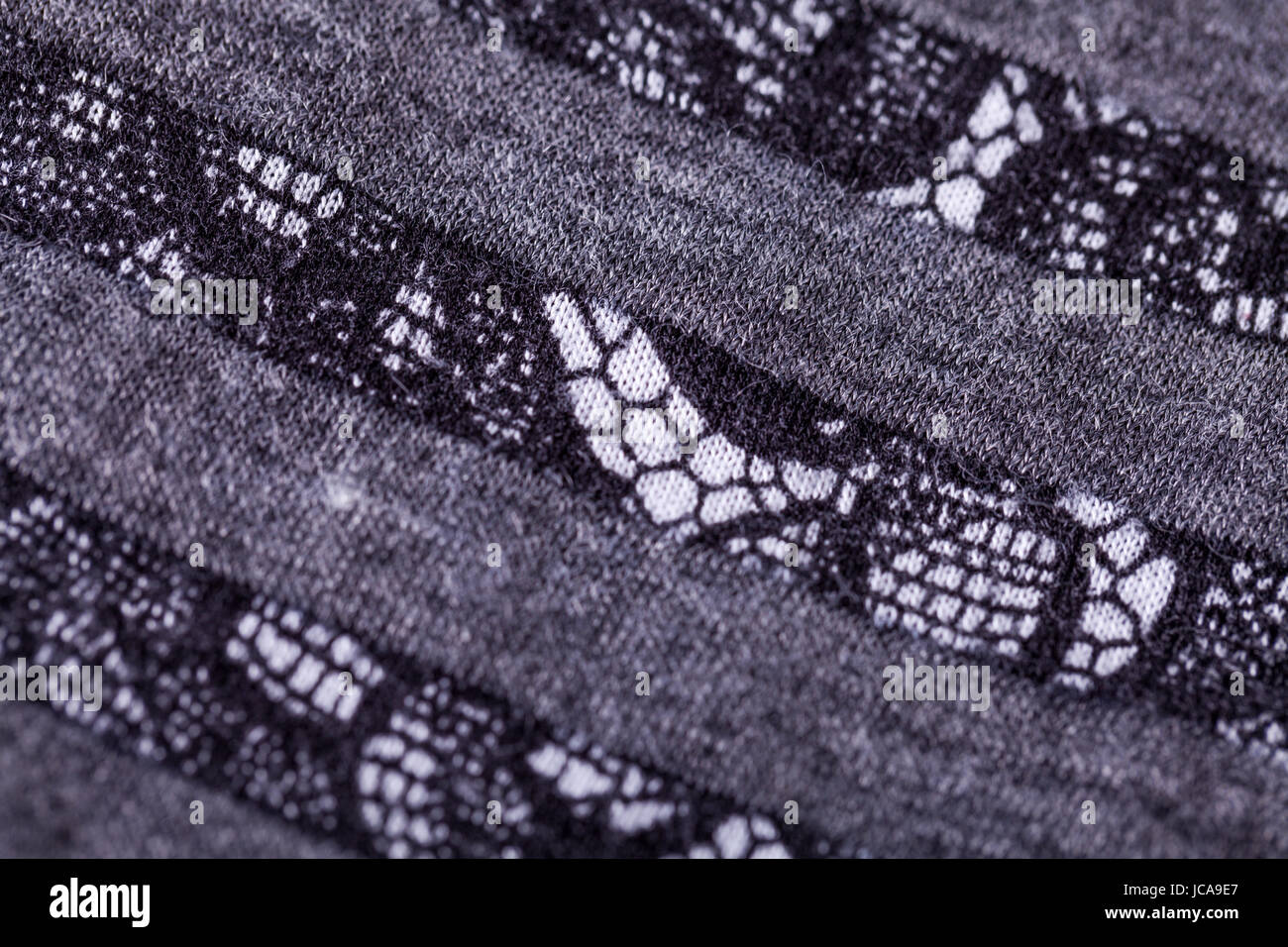 grauer antrazit farbener Stoff aus Wolle Baumwolle mit Spitze Struktur textur als Nahaufnahme Stock Photo