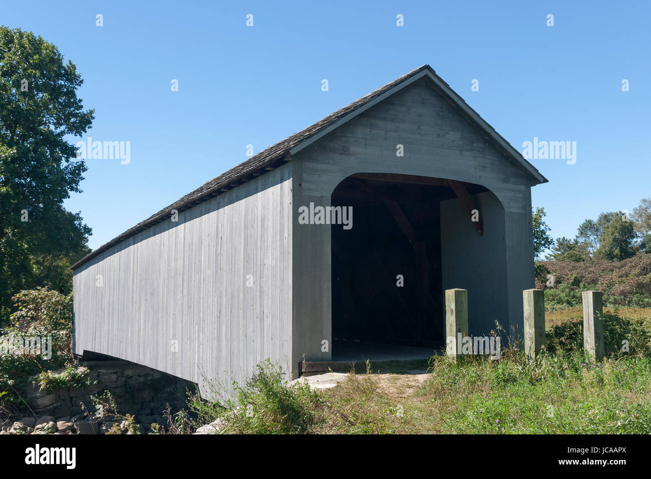 Old Covered bridge, 1854, oldest covered bridge in Sheffield, MA. Restored in 1998. 100 ft. spans Housatonic River. Natl. Register of Historic Places. Stock Photo