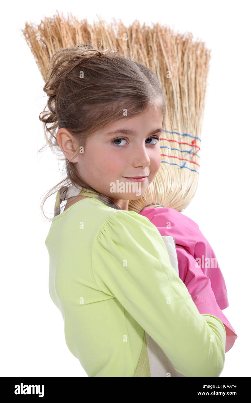 Little girl sweeping Stock Photo Alamy