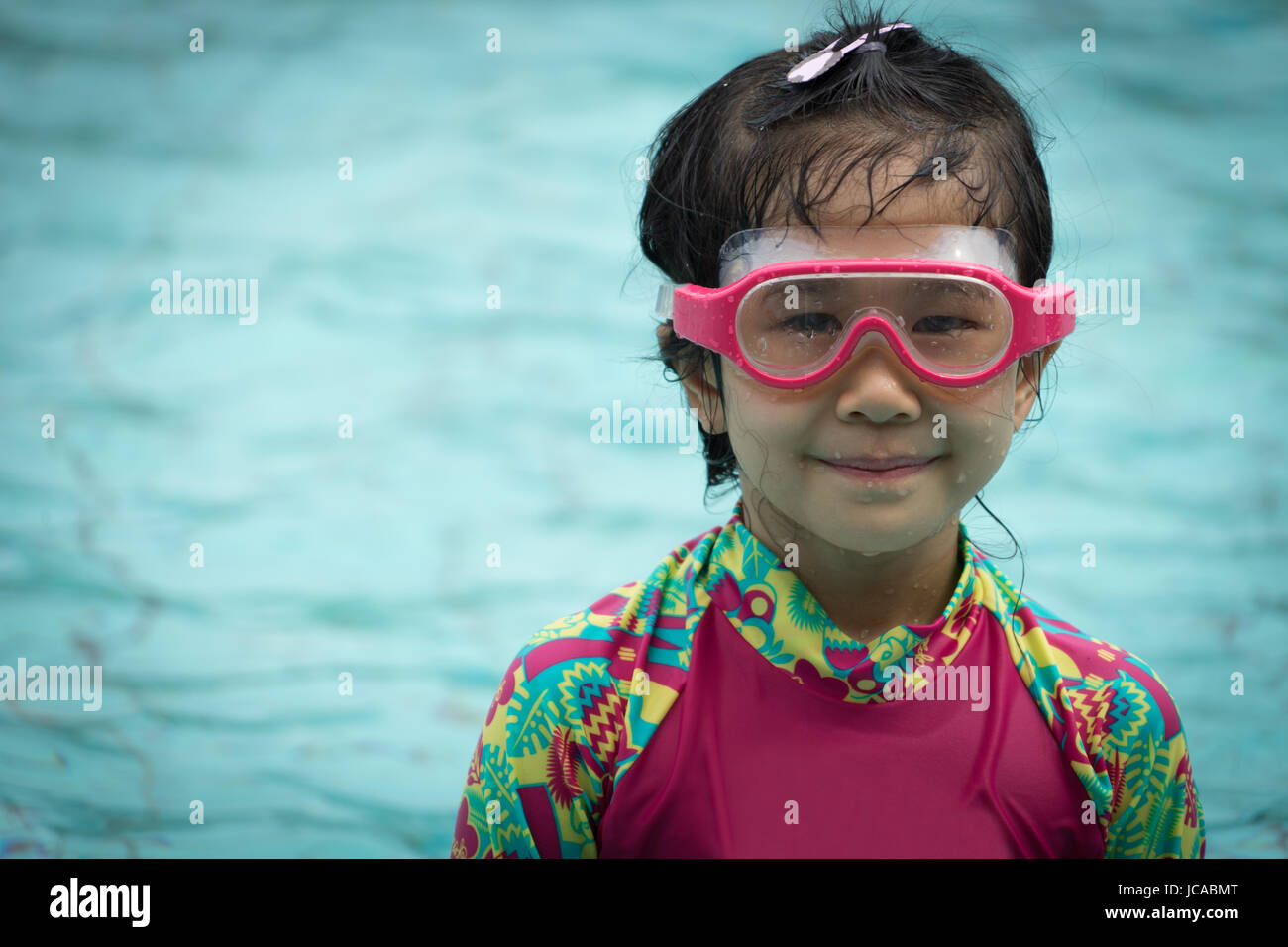 wim smile goggle youth lifestyle asian enjoy swimwear Stock Photo