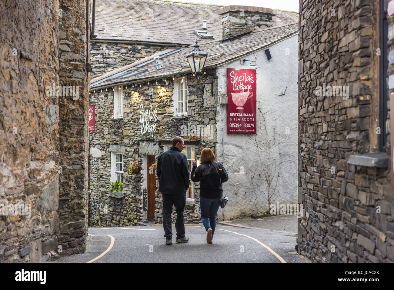 Man Woman Walking Towards Sheila S Cottage Ambleside Lake