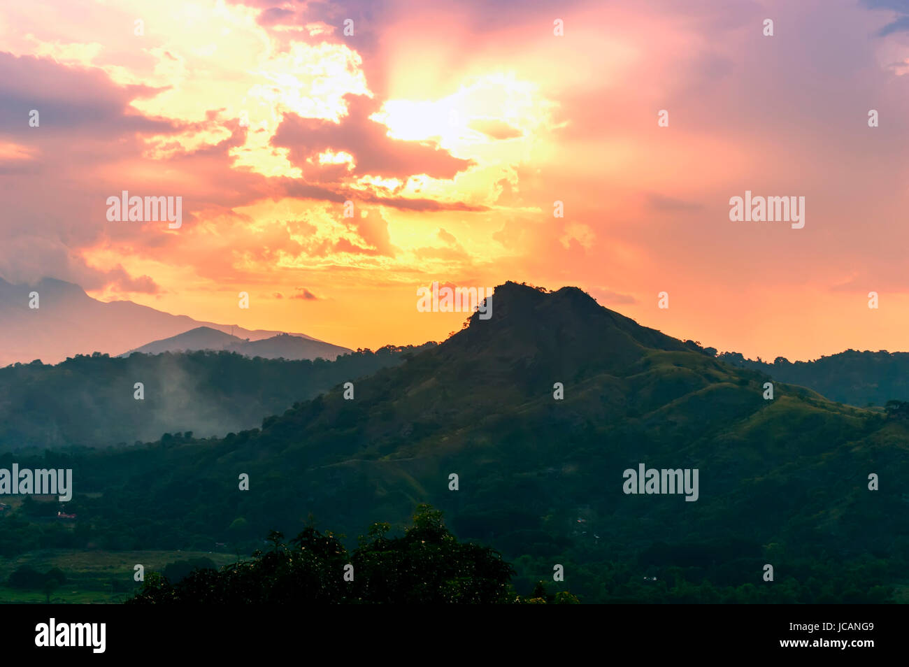 Sun into the Hills. Subic Bay of Luzon Island Philippines. Stock Photo