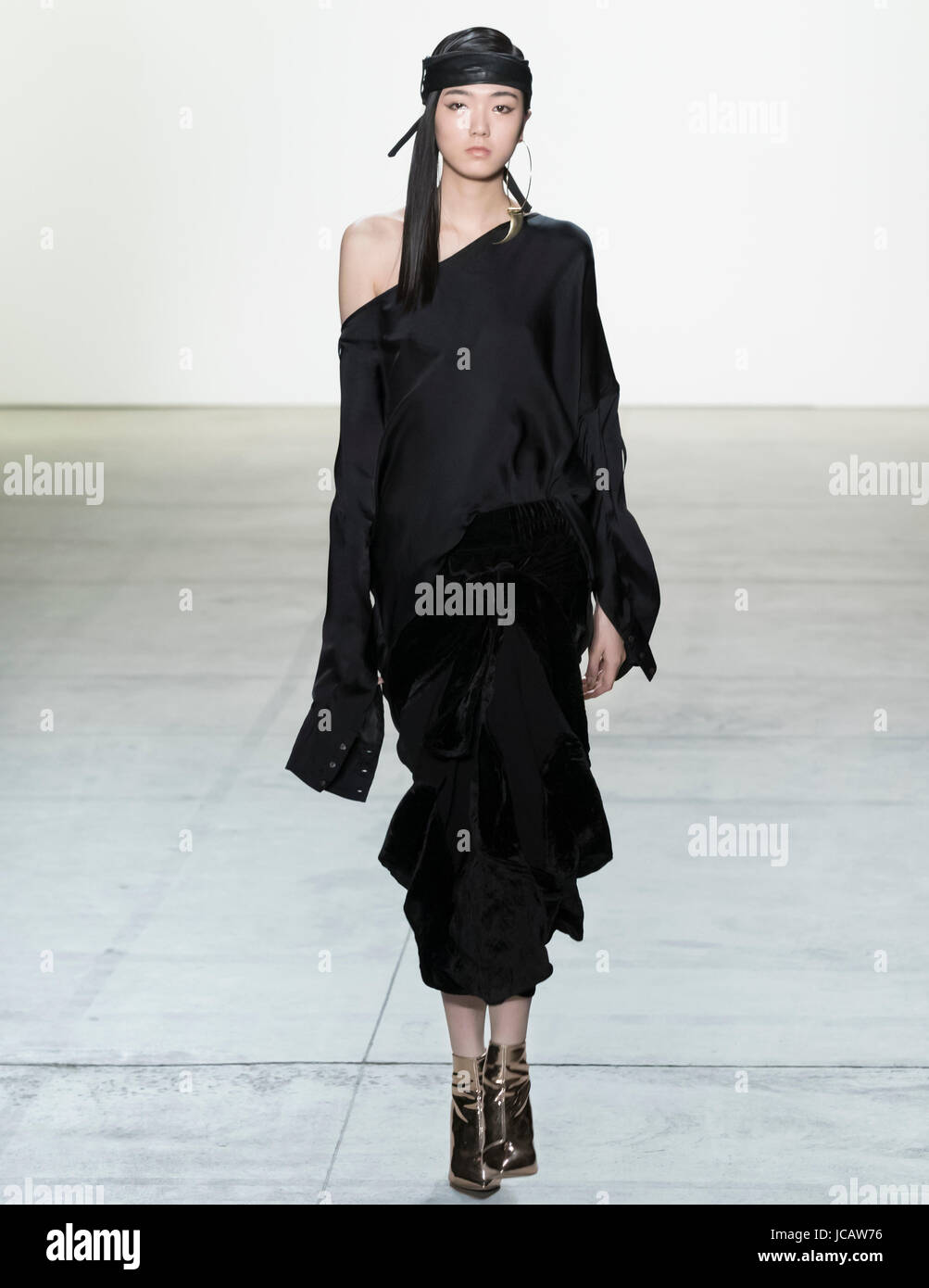 NEW YORK, NY - FEBRUARY 09, 2017: Siqi Chen walks the runway at the ...
