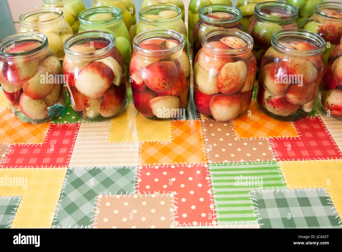 Jars of homemade fruit preserves peach compote Stock Photo Alamy
