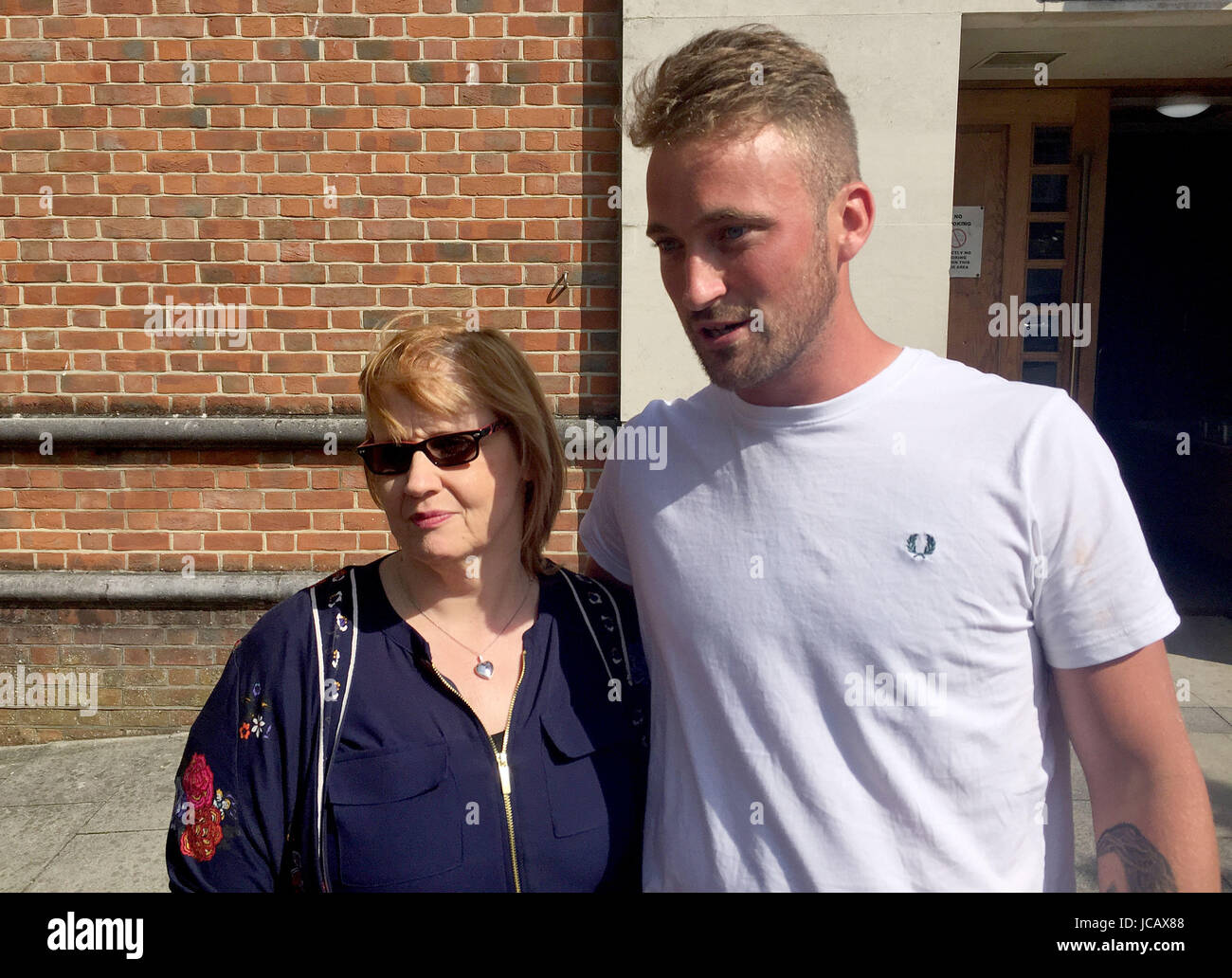 Sara Cotton, mother of Luke Miller, and his friend James Gissing, outside Isle of Wight Coroner's Court in Newport, as a coroner has concluded there is 'no evidence' that Luke, who was found dead in a swimming pool in Thailand, was murdered. Stock Photo