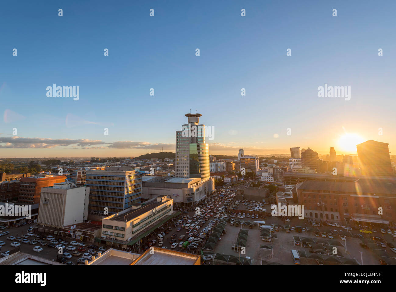 The sun sets over the CBND in Harare, Zimbabwe. Stock Photo