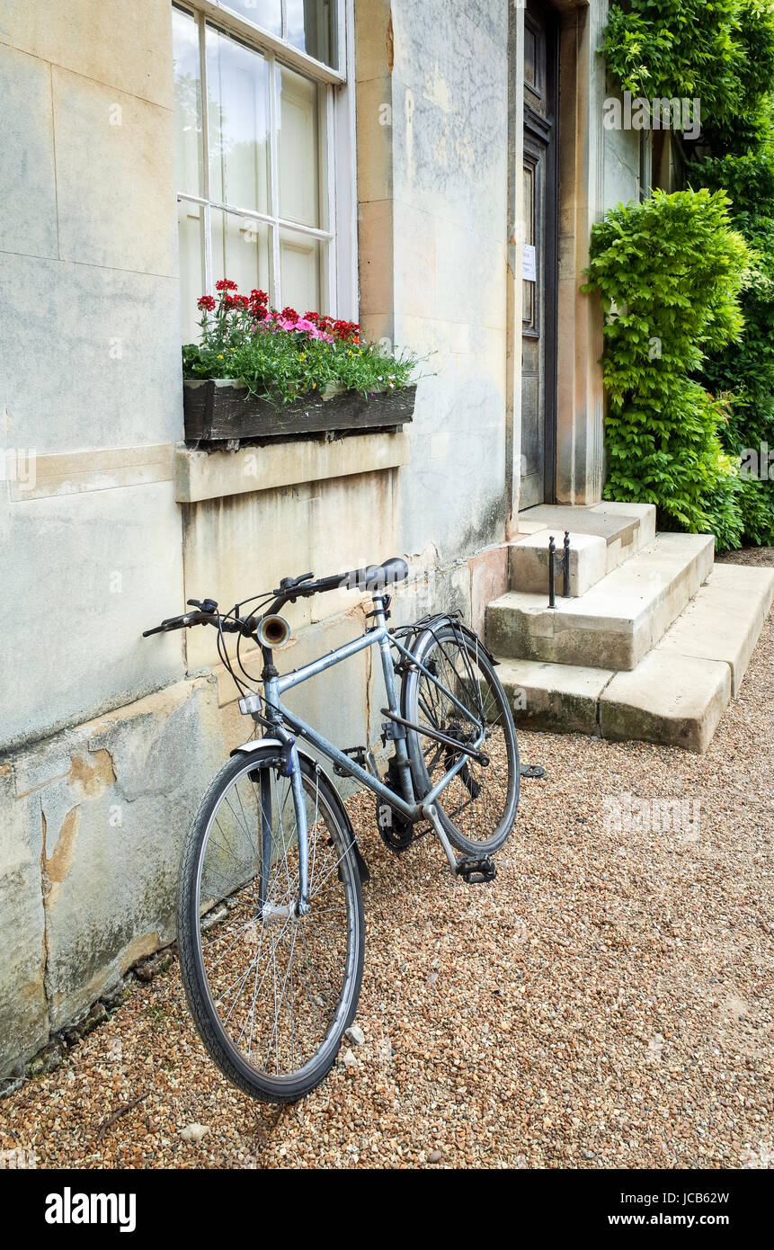 Downing College Cambridge. A student bike parked outside student accommodation in Downing College, part of the University of Cambridge, UK Stock Photo