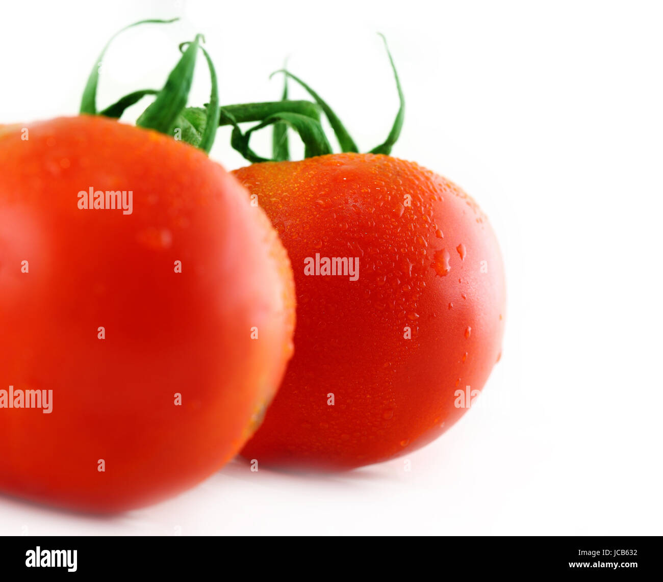 Fresh tomato isolated on white background Stock Photo - Alamy