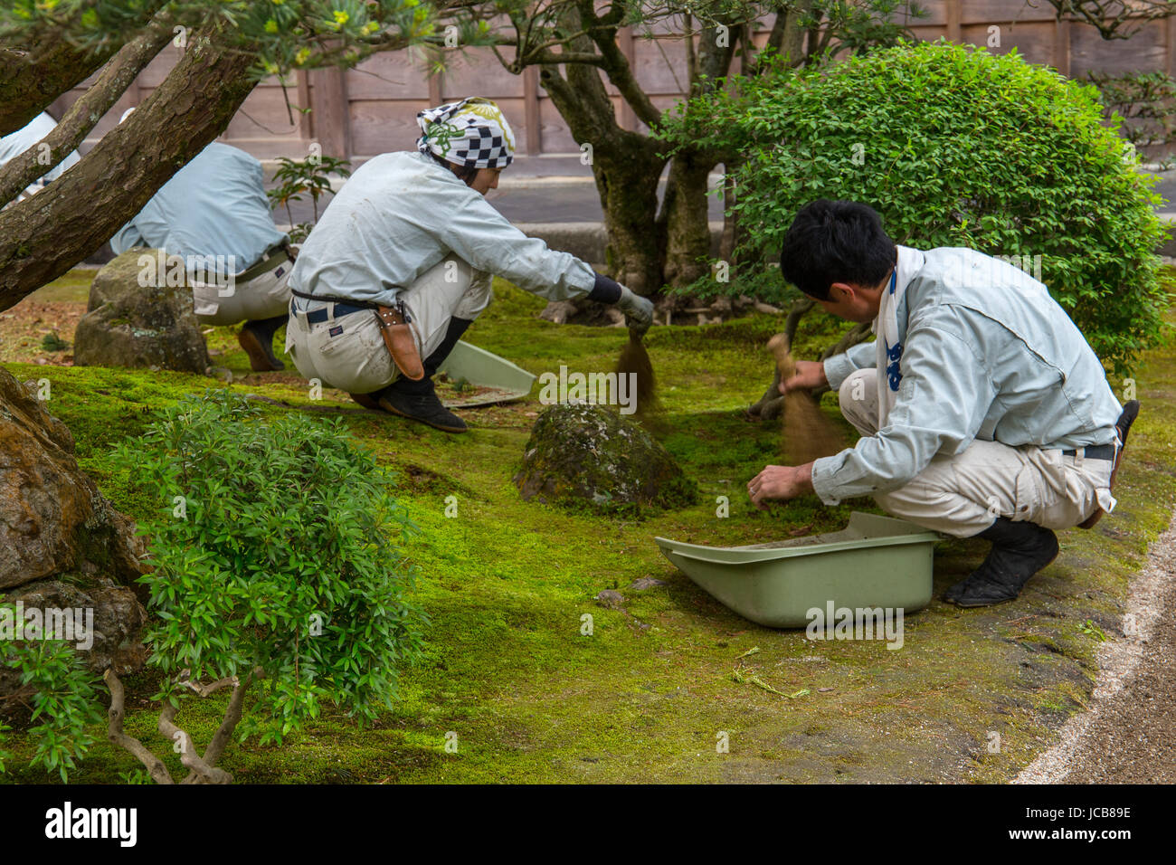 Cleansing the garden in Ginkaku-ji Temple, Kyoto, Japan. Stock Photo