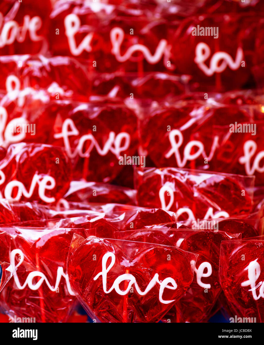 Heart shaped love lollipops as sweet candy background Stock Photo - Alamy