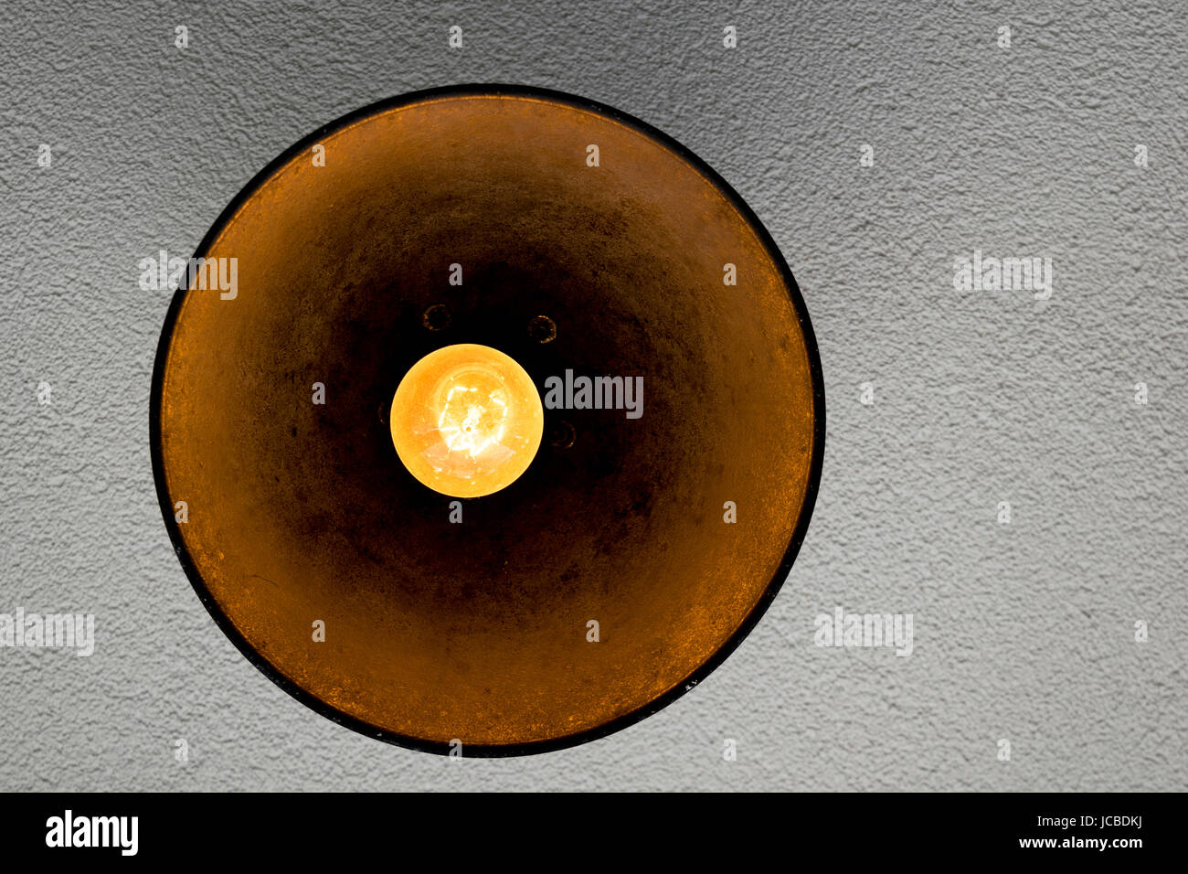 light bulb in rusty fixture overhead Stock Photo Alamy