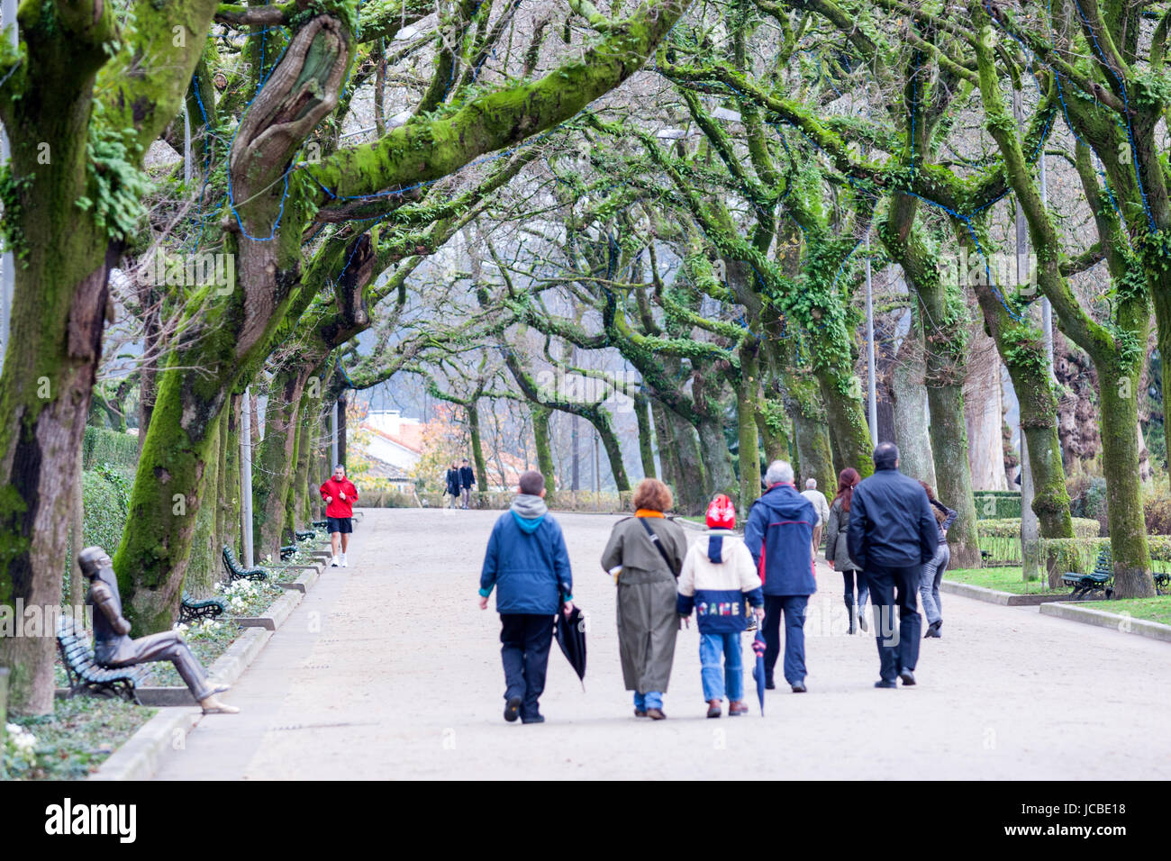 Locals walking along Parque de la  Alameda at Santiago de Compostela, Galicia, Spain Stock Photo