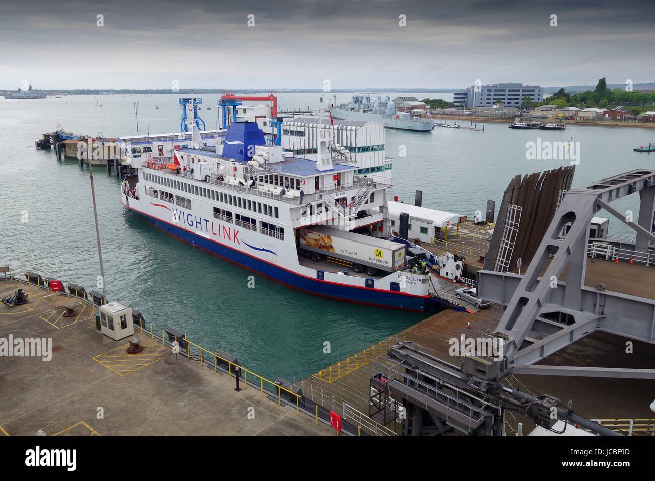 Wightlink ferry St Cecilia loading vehicles at Portsmouth harbour port. Stock Photo
