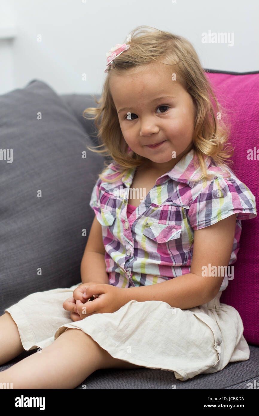 Portrait of cute little girl at home Stock Photo - Alamy