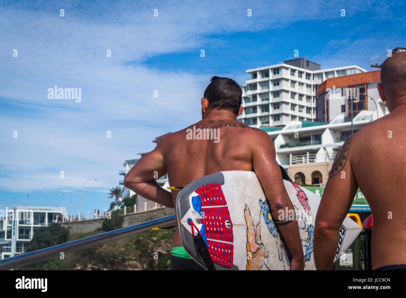 Two men with surfboards, Bondi beach, Sydney, NSW,  Australia Stock Photo