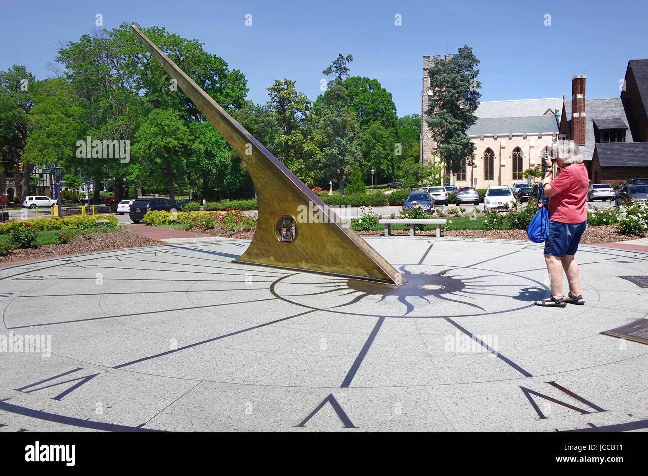 Woman photographing the Morehead Planetarium Sundial, Unversity of North Carolina, Chapel Hill, North Carolina Stock Photo