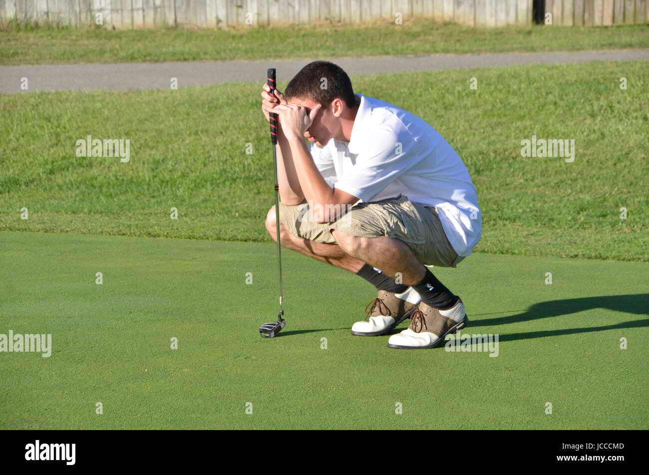 young man playing golf Stock Photo