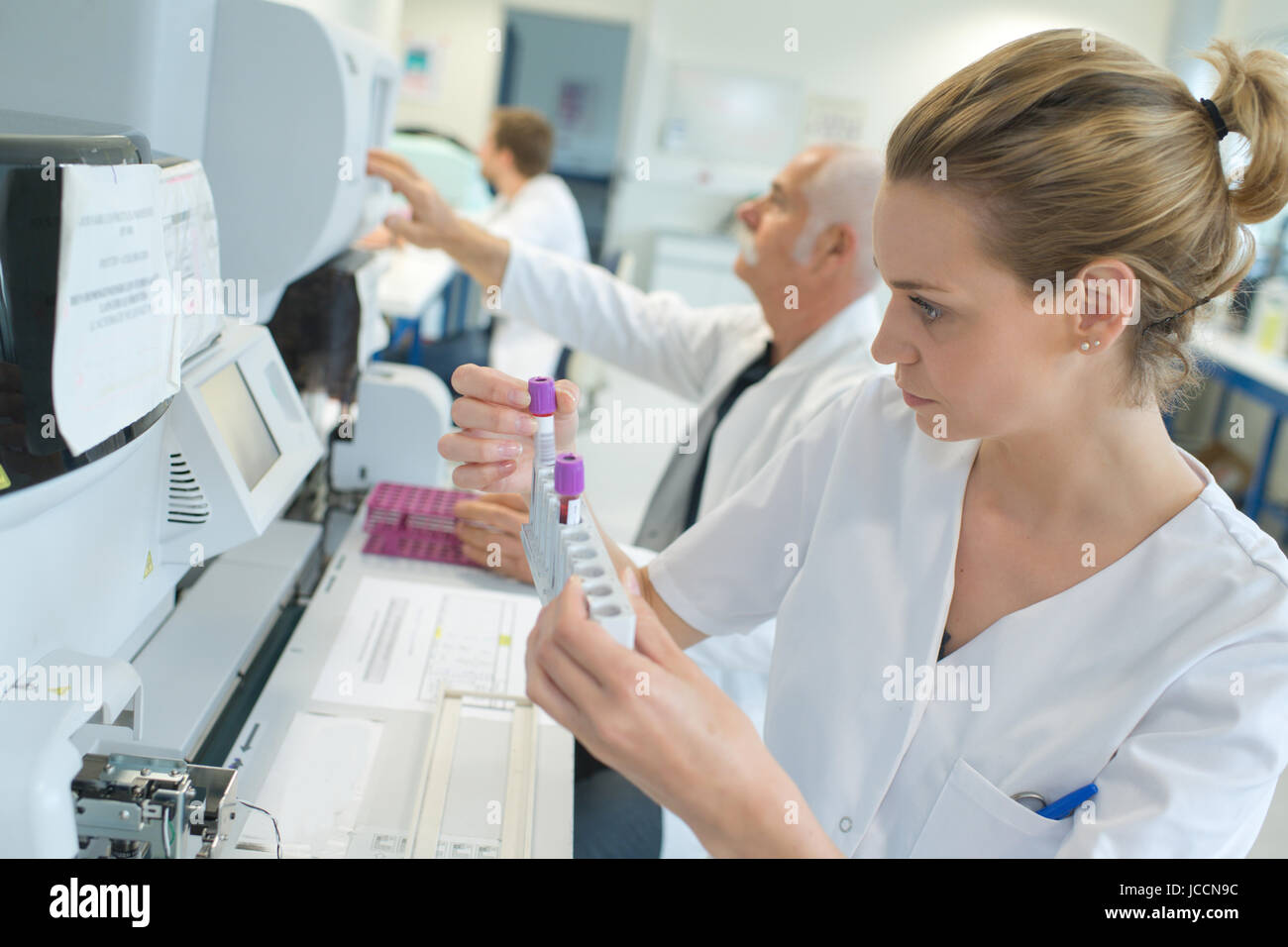 female scientist performing tests in the laboratory Stock Photo - Alamy