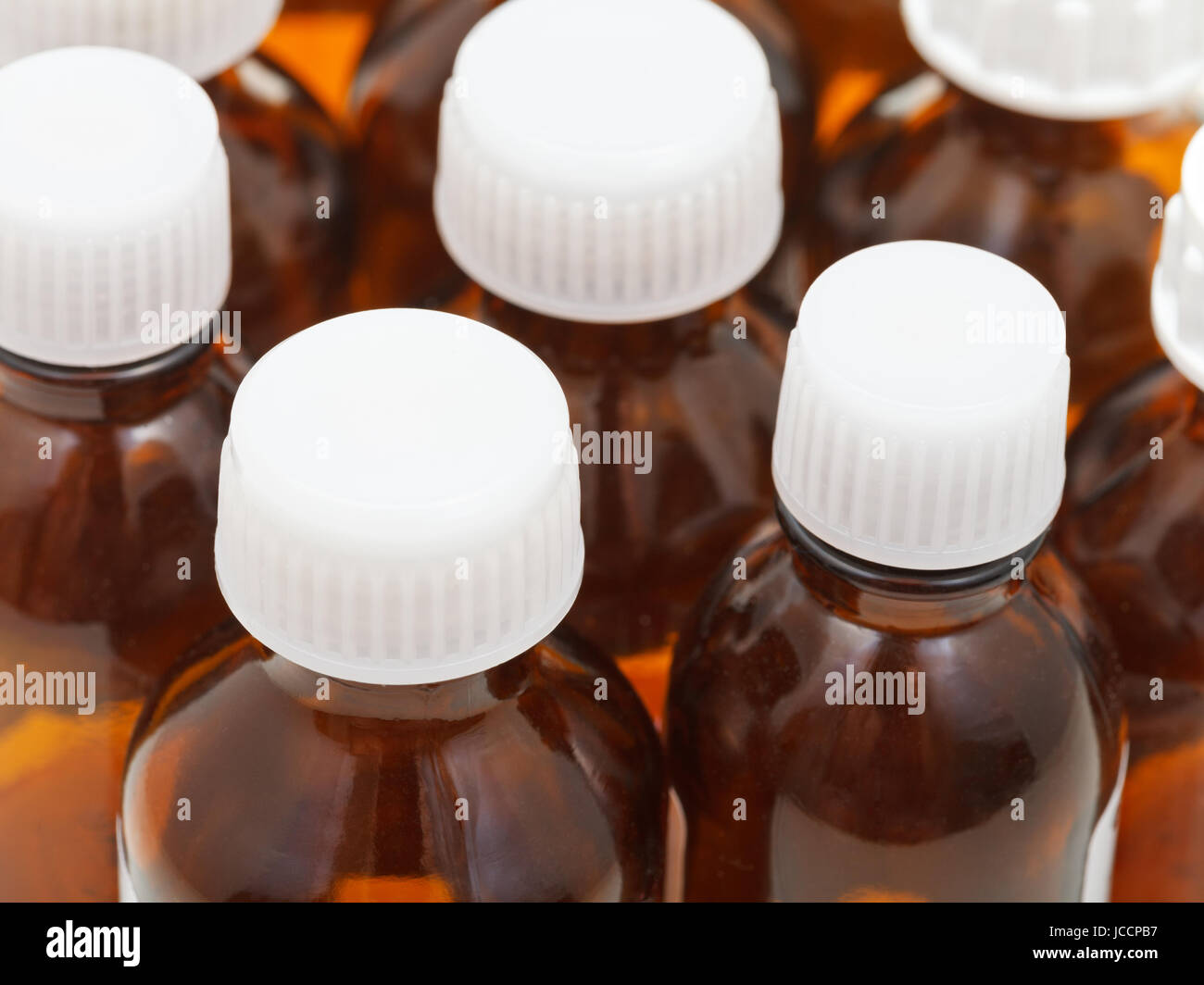 Download Many Little Closed Amber Glass Oval Pharmacy Bottles Close Up Stock Photo Alamy Yellowimages Mockups