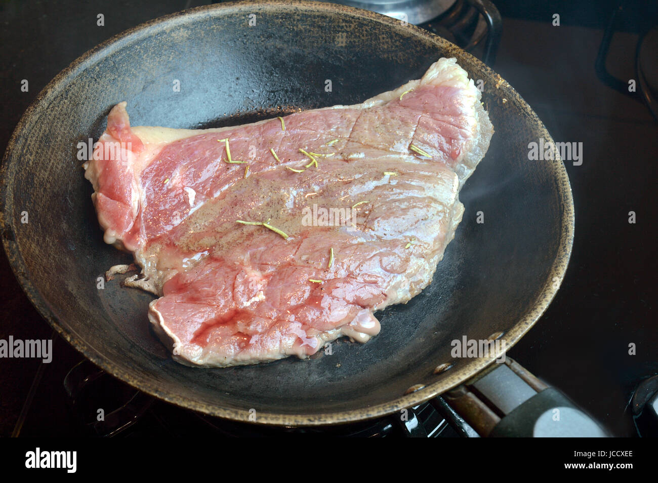 Steak being cooked hires stock photography and images Alamy