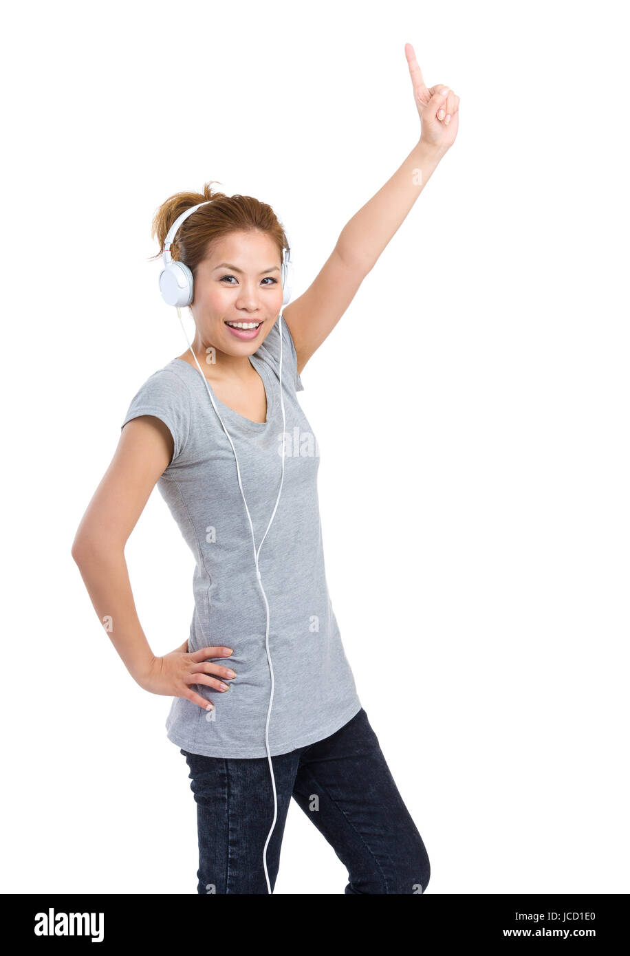 Woman with headphone and finger up Stock Photo