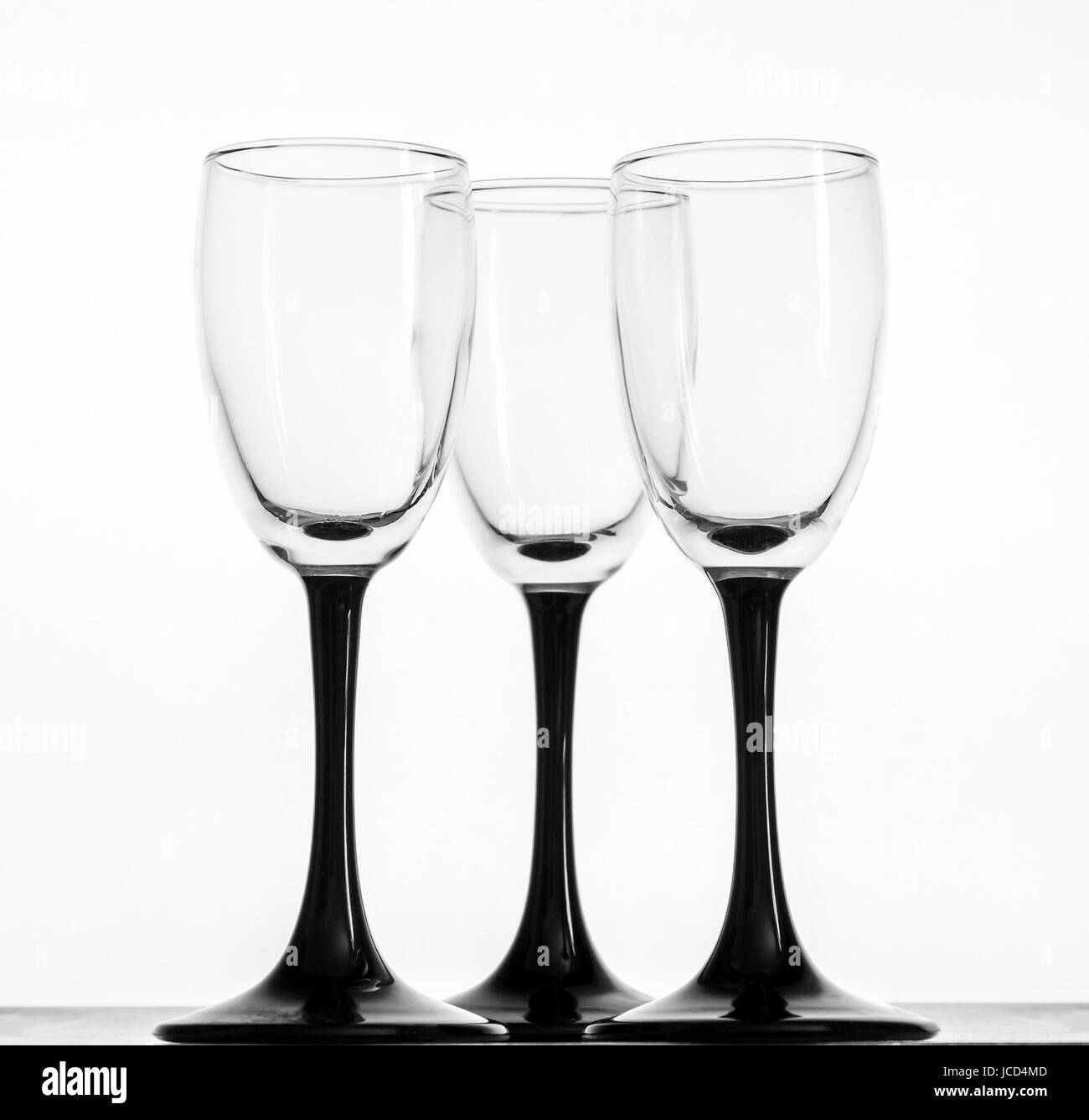 Three glasses of spirits on a white background Stock Photo