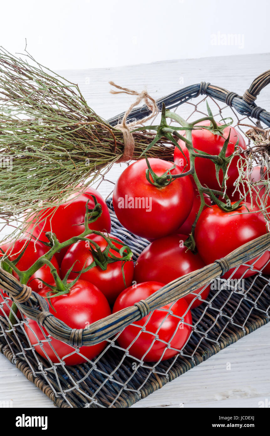 tomatoes in the basket Stock Photo - Alamy