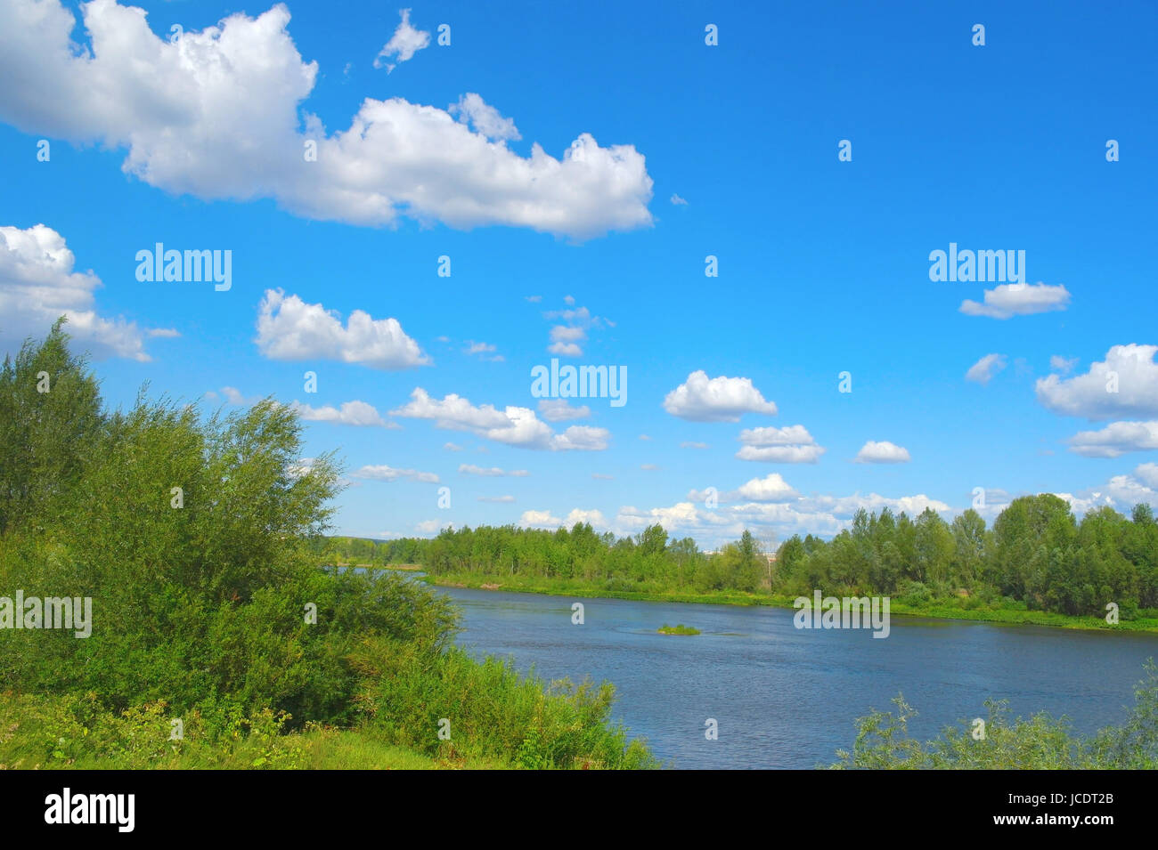 Beautiful summer landscape with river, blue sky and clouds Stock Photo ...
