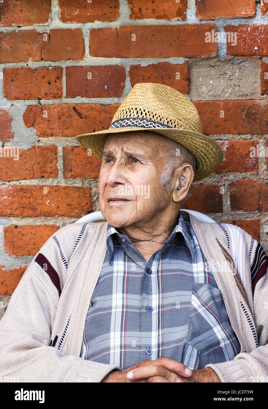 Old man white hair cardigan hi-res stock photography and images - Alamy