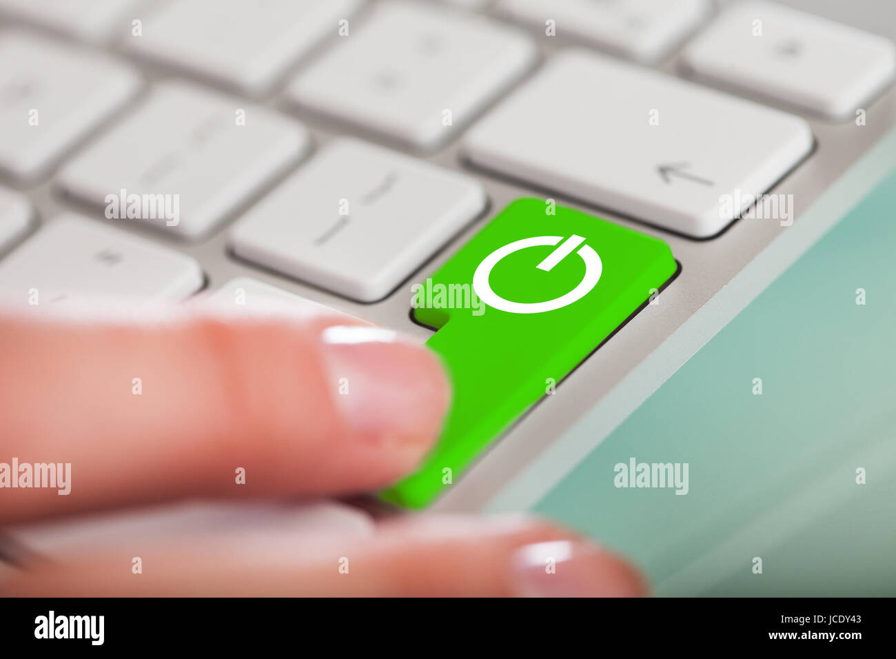 Close-up Of Hand Pushing The Power Button On Keyboard Stock Photo - Alamy