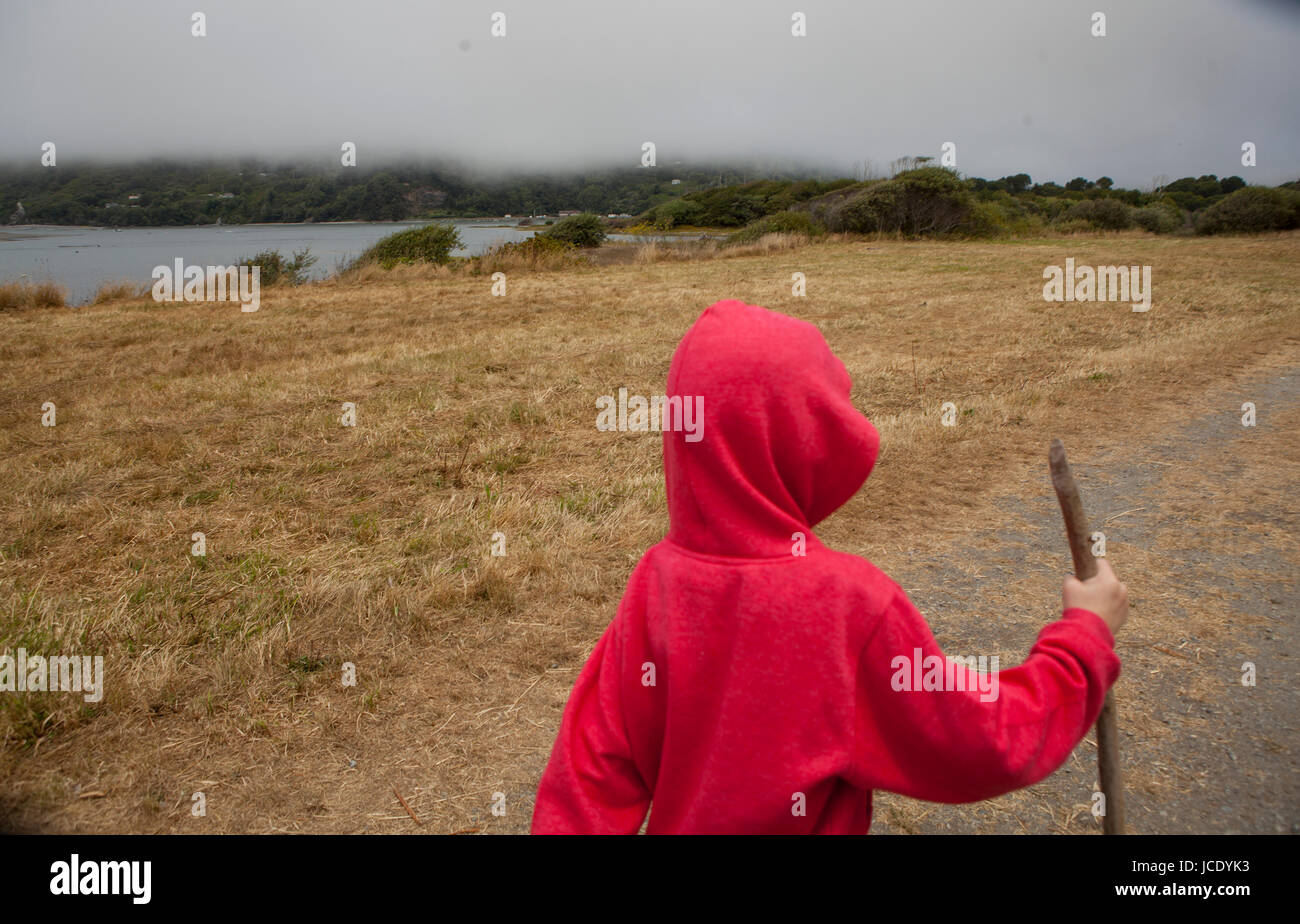 A 7 year old boy hiking during a family road trip. Stock Photo