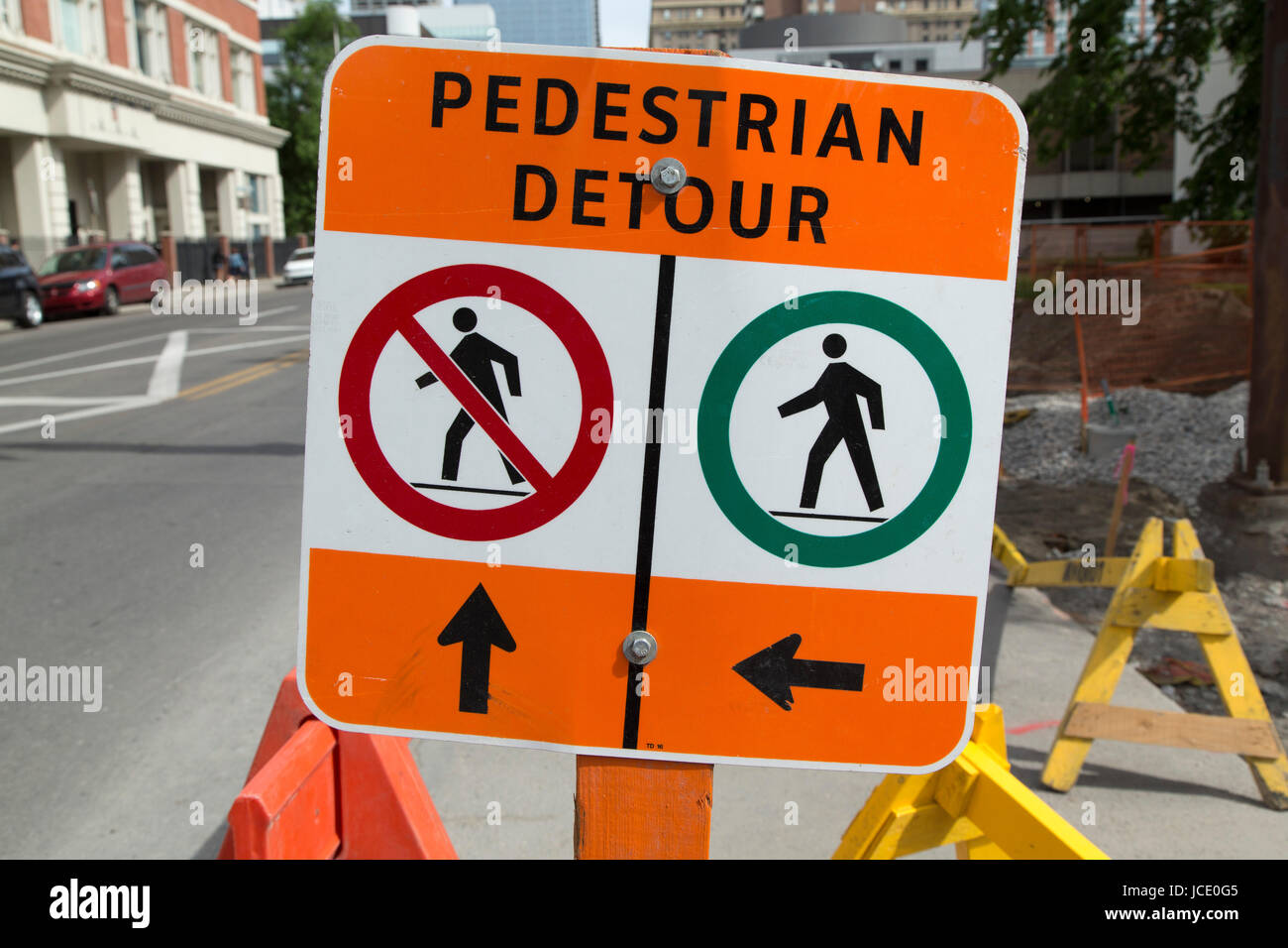 Sign for a pedestrian detour on a street in Calgary, Canada. The sign