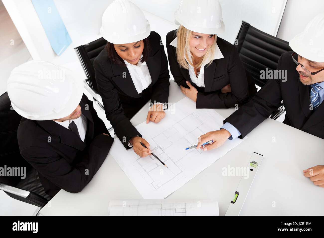 Group of architects at the meeting discussing the project Stock Photo ...