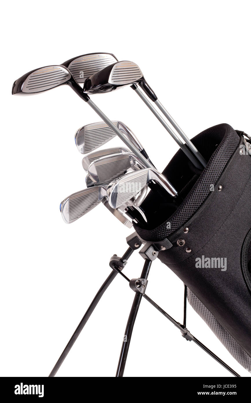 various golf clubs in carrier bage isolated on white background Stock Photo