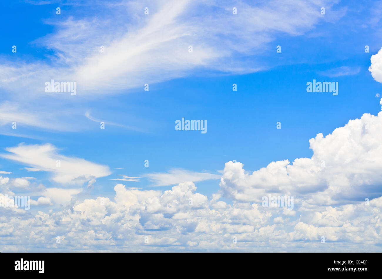 Blue sky with white clouds in the summer Stock Photo - Alamy