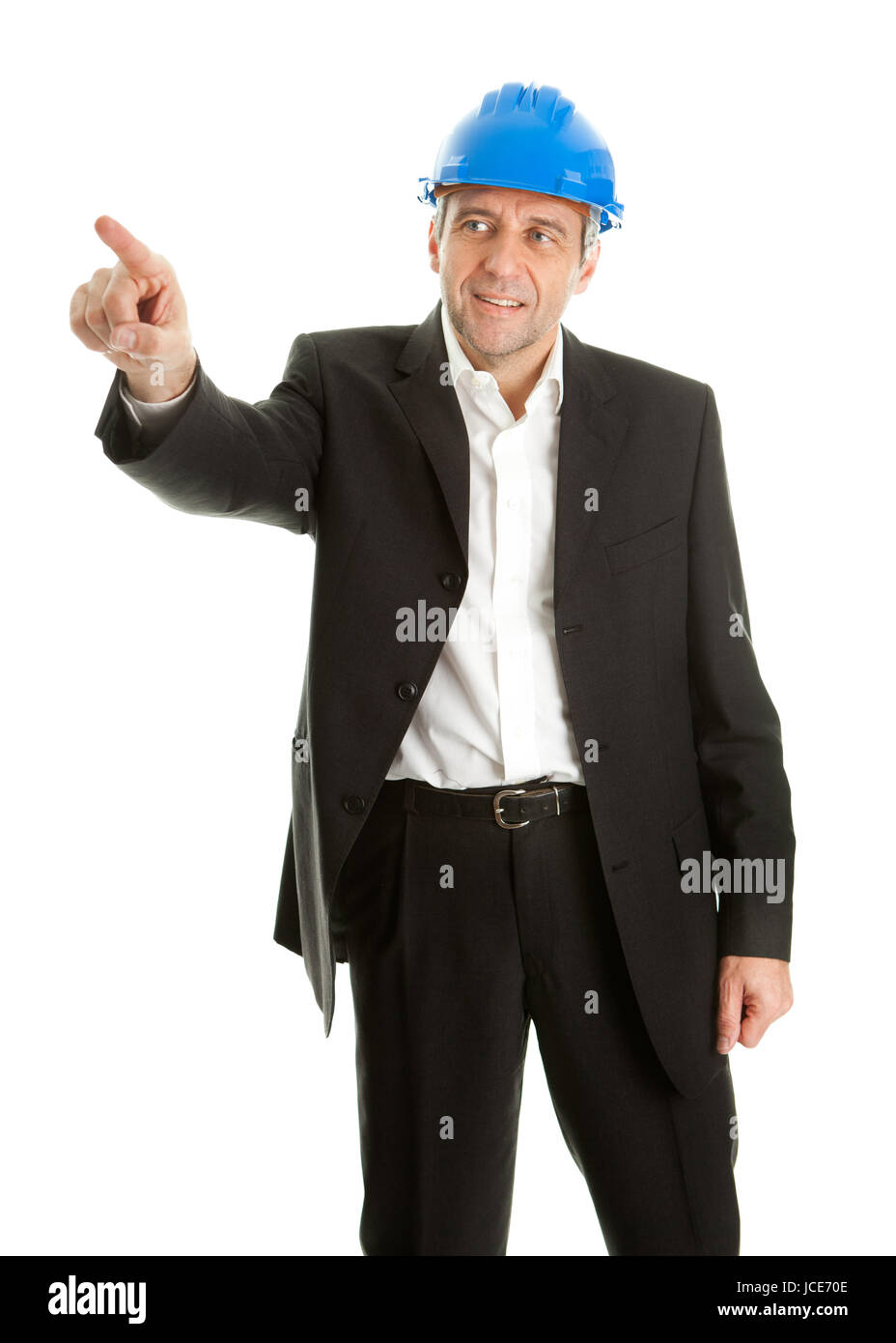 Portrait of successfull architect wearing blue hard hat and pointing