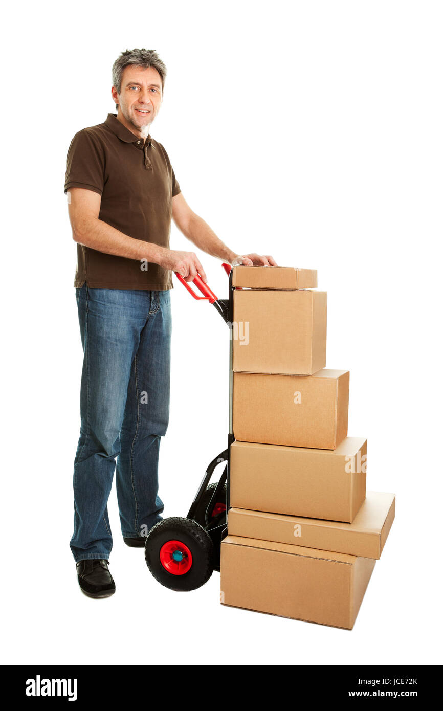 Delivery man with hand truck and stack of boxes. Isolated on white ...