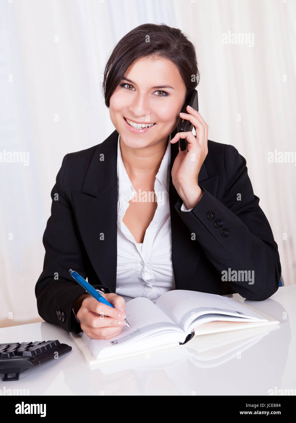 Takes notes Brunette