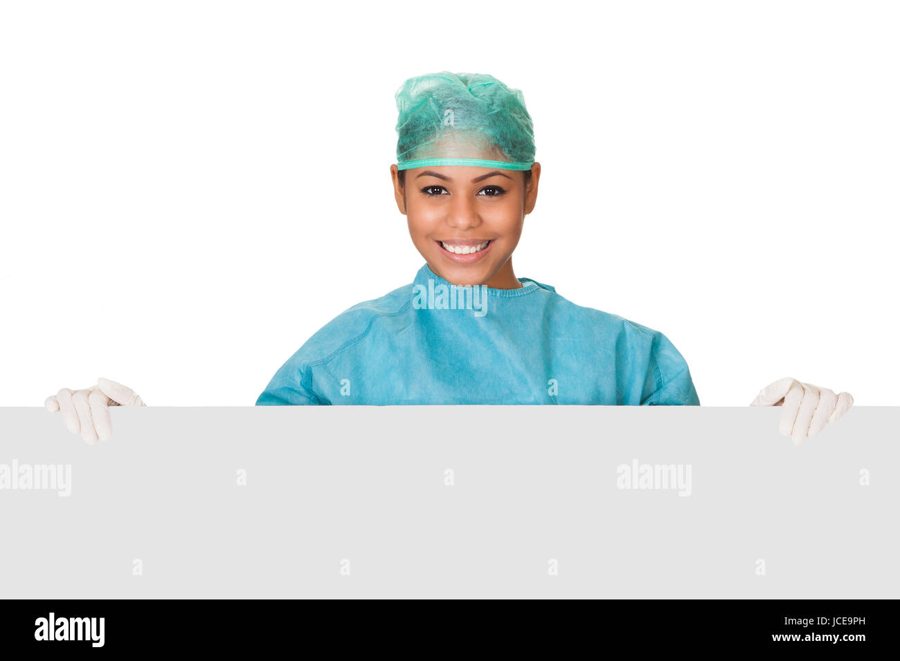 Happy Female Surgeon Holding Placard. Isolated On White Stock Photo - Alamy
