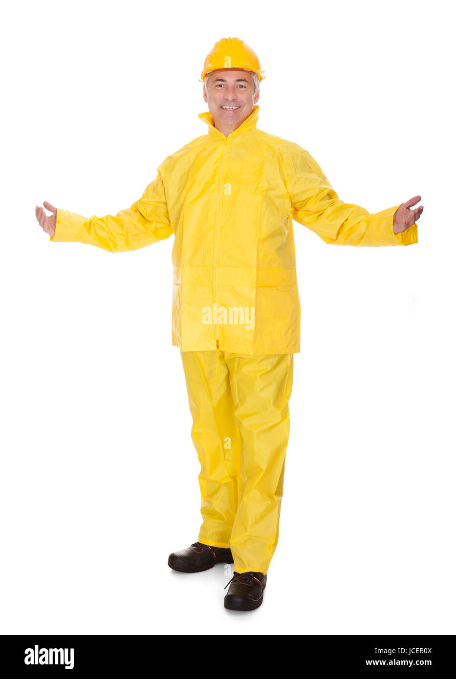 Man Wearing Raincoat High Resolution Stock Photography and Images - Alamy