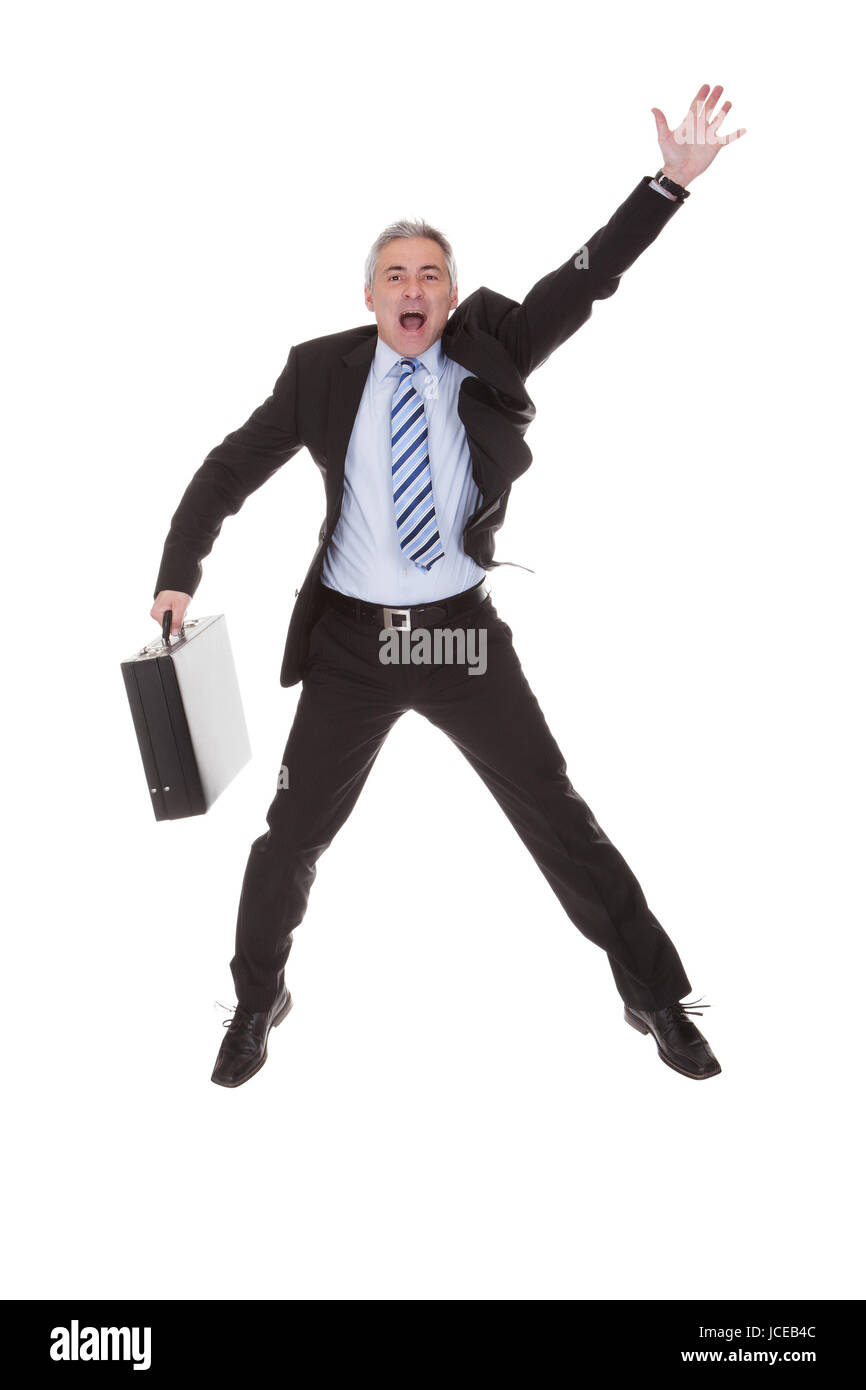 Worried Businessman Hailing A Cab Over White Background Stock Photo