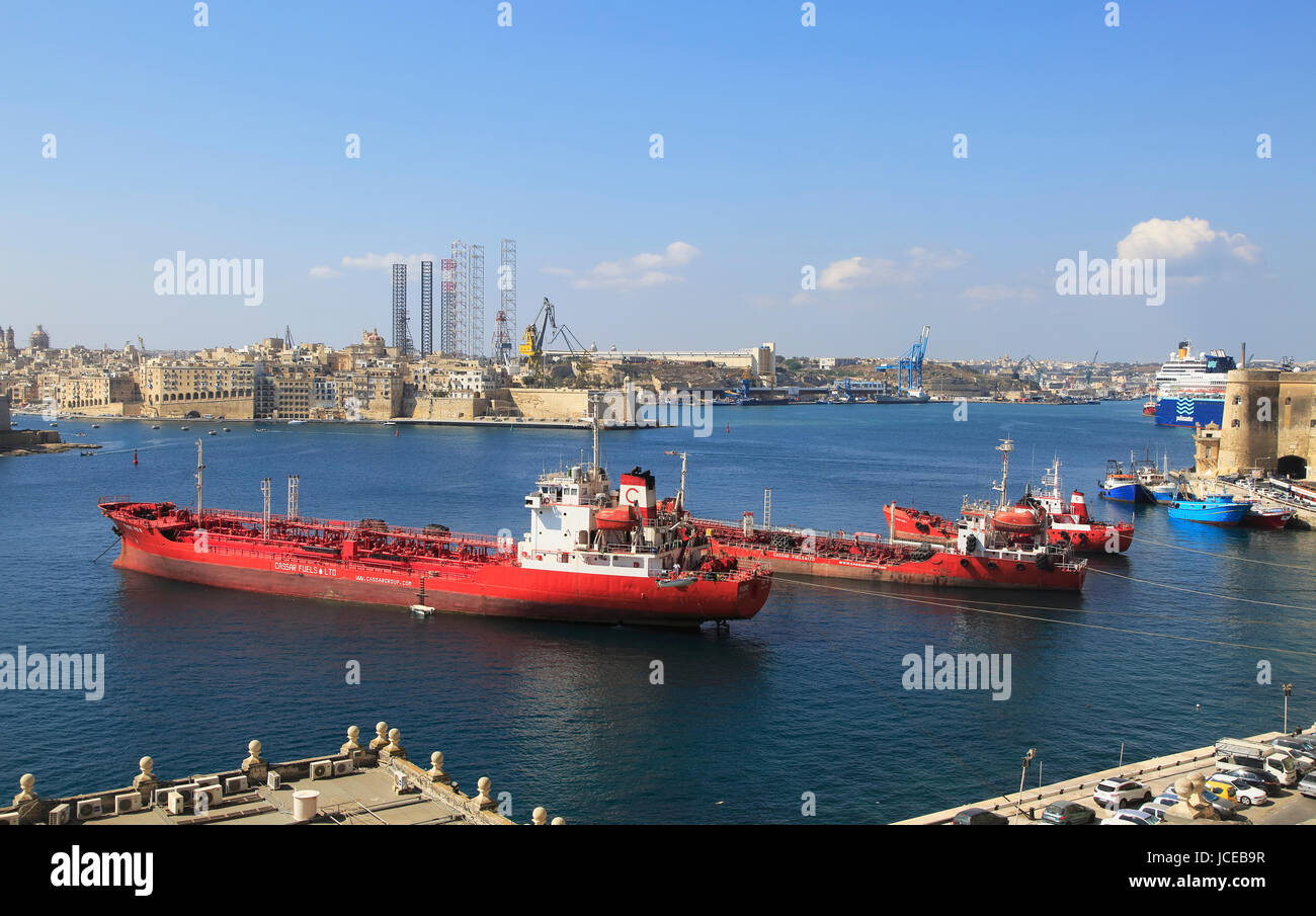 Merchant shipping and cruise ships in Grand Harbour, Valletta, Malta Stock Photo