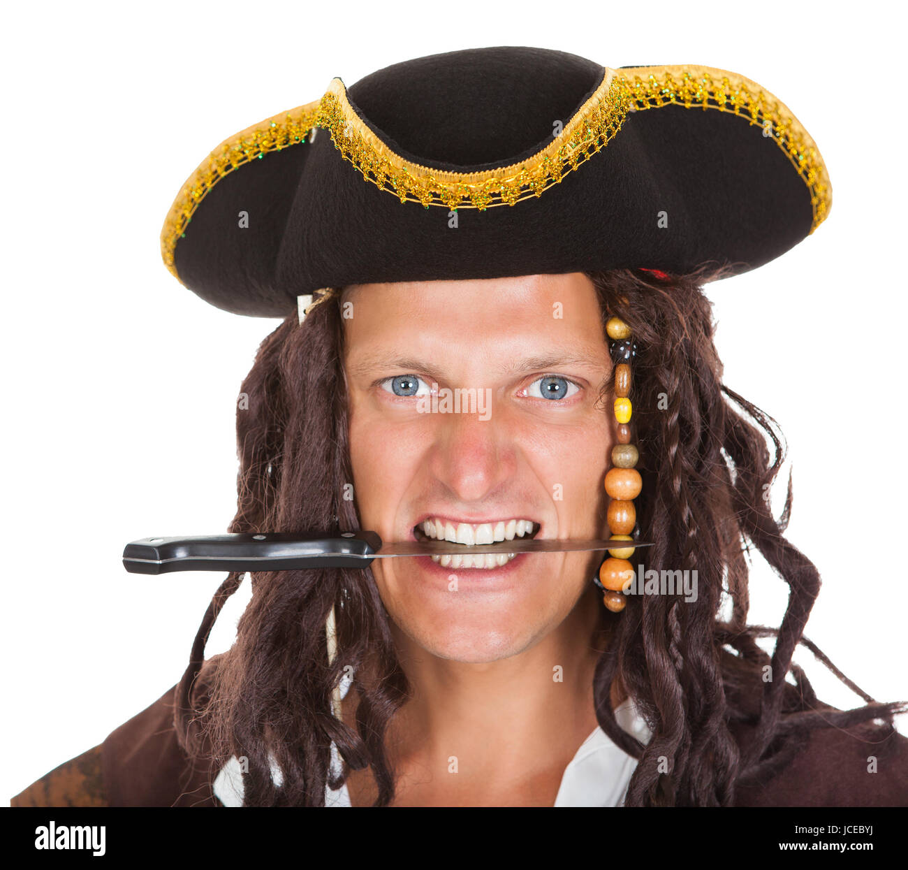 Man holding knife in mouth hires stock photography and images Alamy