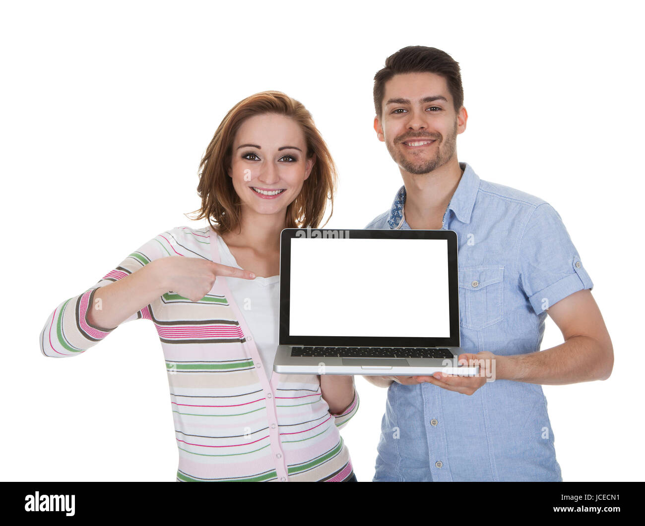 Young Happy Couple Holding Laptop Isolated Over White Background Stock ...
