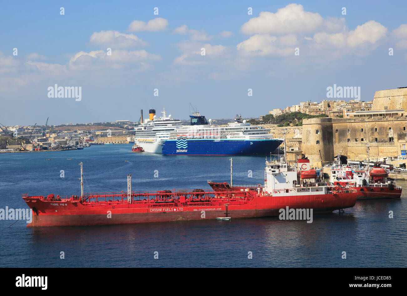 Merchant shipping and cruise ships in Grand Harbour, Valletta, Malta Stock Photo